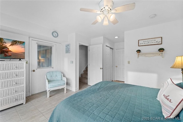 bedroom with light tile patterned floors, baseboards, ceiling fan, and access to outside