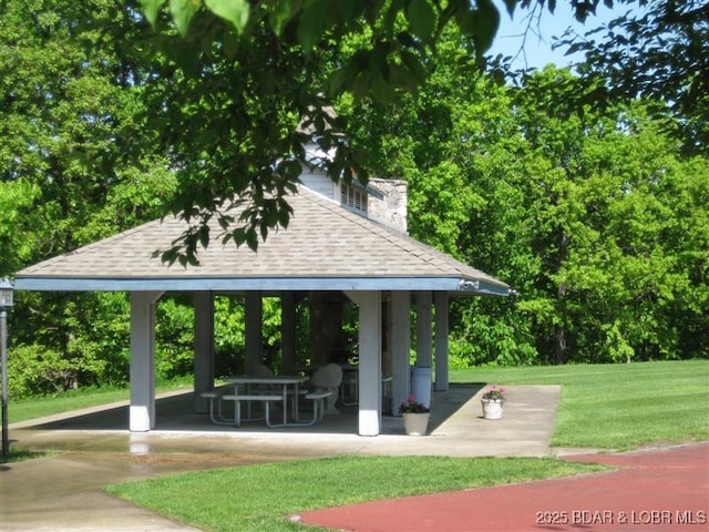 view of community with a gazebo and a lawn