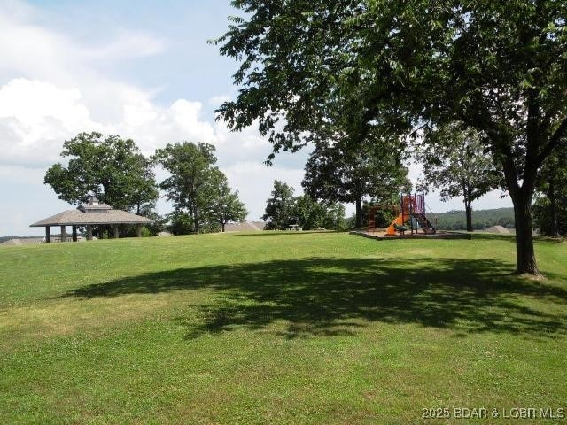 view of yard featuring playground community