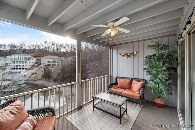 balcony featuring a ceiling fan