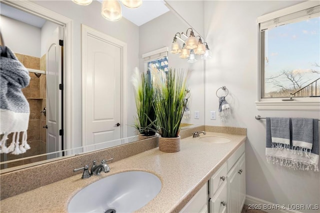 bathroom with double vanity and a sink