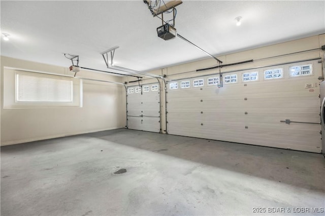 garage featuring a garage door opener