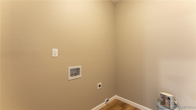 laundry room with hookup for a washing machine, baseboards, light wood finished floors, laundry area, and electric dryer hookup