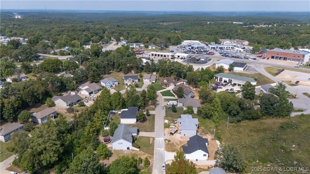 aerial view with a forest view and a residential view