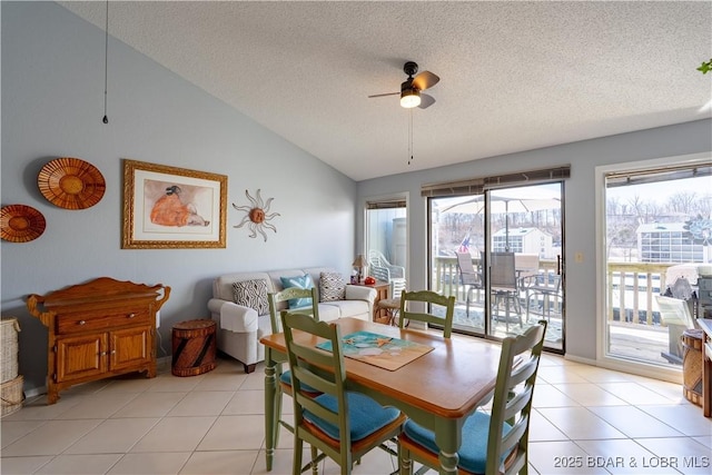 123 Southwood Shores Dr Unit 4C, Lake Ozark, MO 65049 - dining room with vaulted ceiling, a ceiling fan, a textured ceiling, and light tile patterned floors