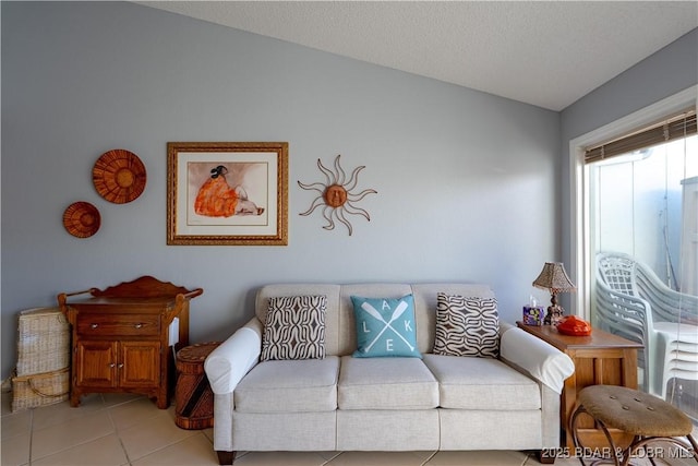 living room with vaulted ceiling and a textured ceiling