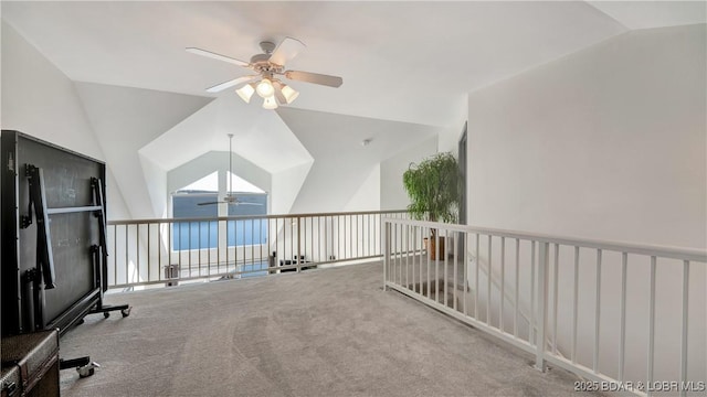 interior space with lofted ceiling and carpet