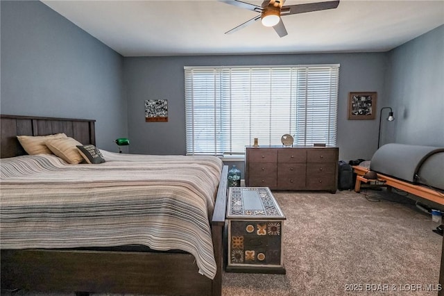 bedroom featuring carpet and a ceiling fan