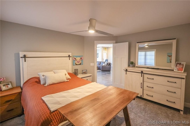 bedroom featuring a ceiling fan and carpet floors