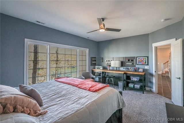 bedroom with visible vents, carpet, and ceiling fan