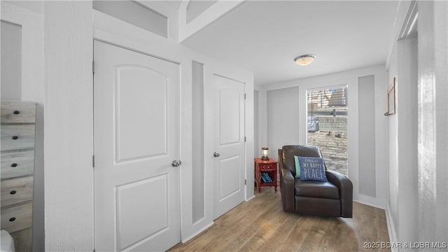 sitting room with wood finished floors