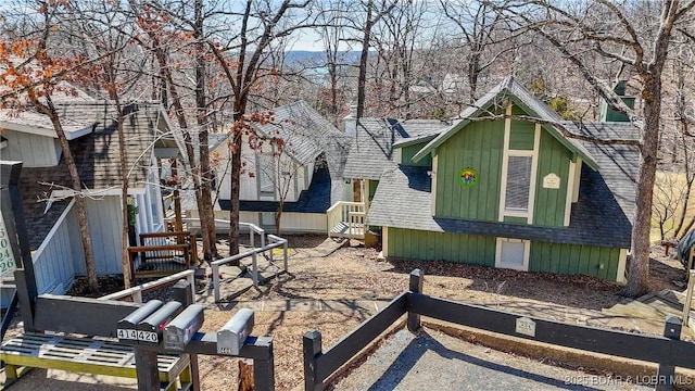 view of front of house featuring a shingled roof