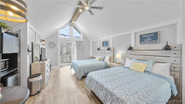 bedroom with a ceiling fan, light wood-style floors, vaulted ceiling with beams, and access to outside