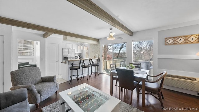 dining area with beamed ceiling, a wall mounted AC, dark wood-type flooring, and ceiling fan