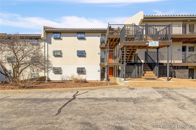85 La Jolla Dr Unit 1C/346, Lake Ozark, MO 65049 - view of building exterior featuring stairs