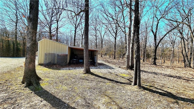 view of front facade with an outbuilding and a pole building