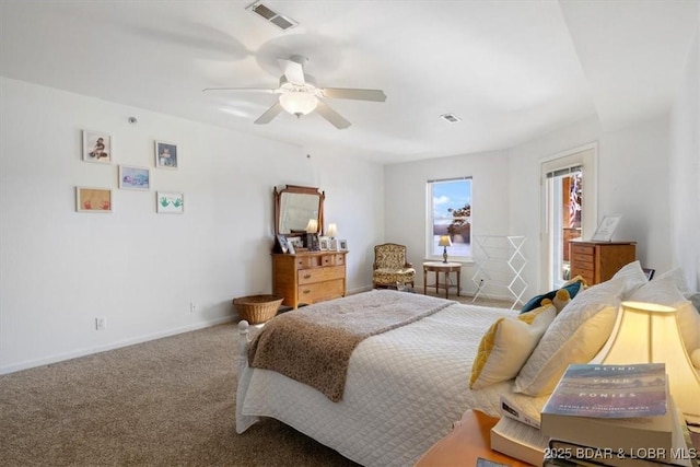 bedroom featuring visible vents, baseboards, a ceiling fan, and carpet flooring