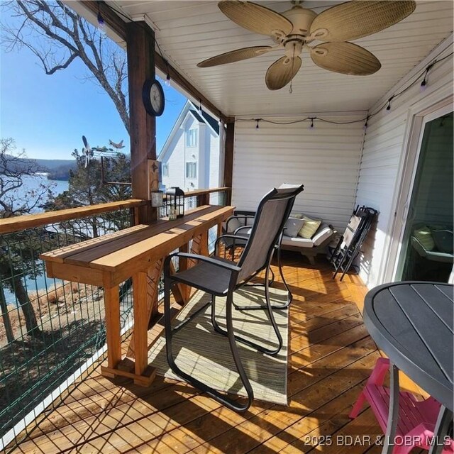 222 Park Place Ln Unit 2C, Kaiser, MO 65047 - wooden deck with a ceiling fan