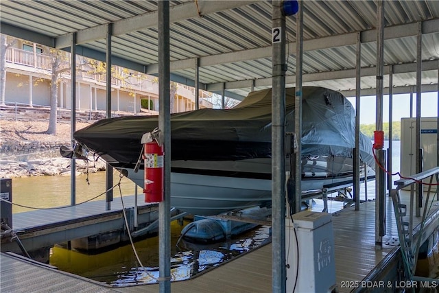 view of dock with boat lift