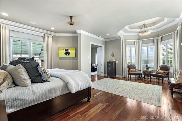 bedroom with crown molding, dark wood-type flooring, baseboards, recessed lighting, and a notable chandelier