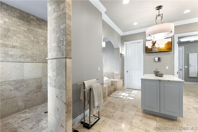 bathroom featuring baseboards, a garden tub, crown molding, and a walk in shower