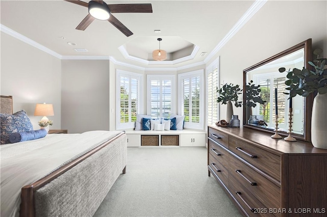 carpeted bedroom featuring visible vents, multiple windows, and ornamental molding