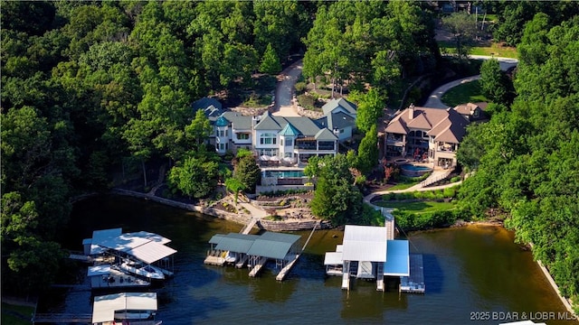 drone / aerial view with a water view