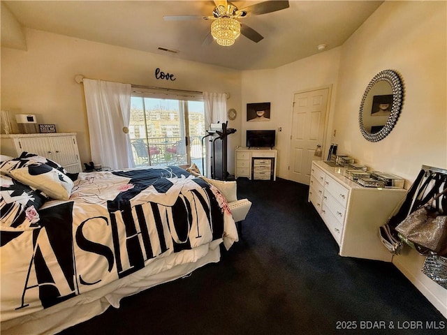 bedroom with access to outside, visible vents, dark colored carpet, and ceiling fan