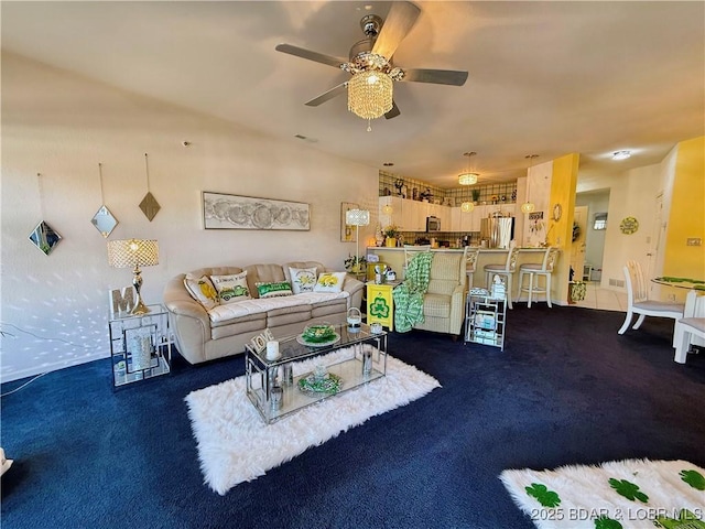 carpeted living room featuring a ceiling fan