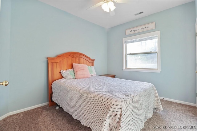 bedroom featuring visible vents, baseboards, and carpet floors