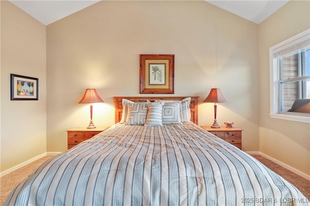 bedroom featuring baseboards and carpet