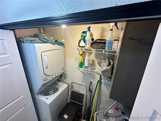 laundry room with laundry area and stacked washer / dryer