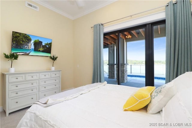 bedroom featuring visible vents, carpet flooring, crown molding, and access to outside