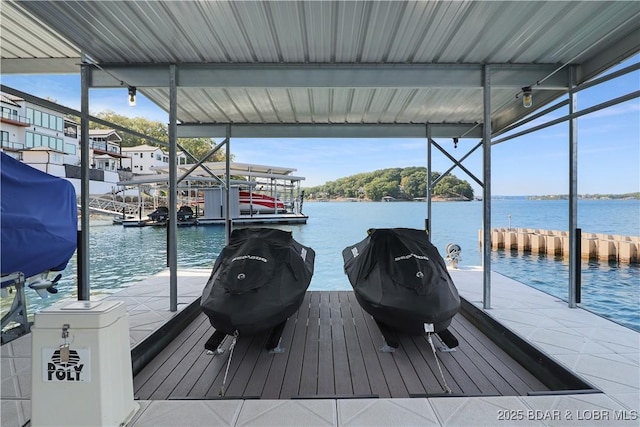 view of dock with a water view