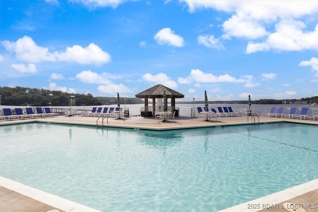 view of pool featuring a gazebo and a patio area