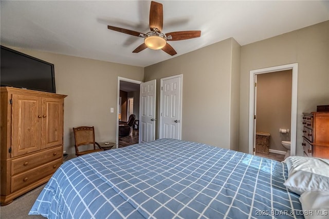 bedroom featuring a ceiling fan and connected bathroom