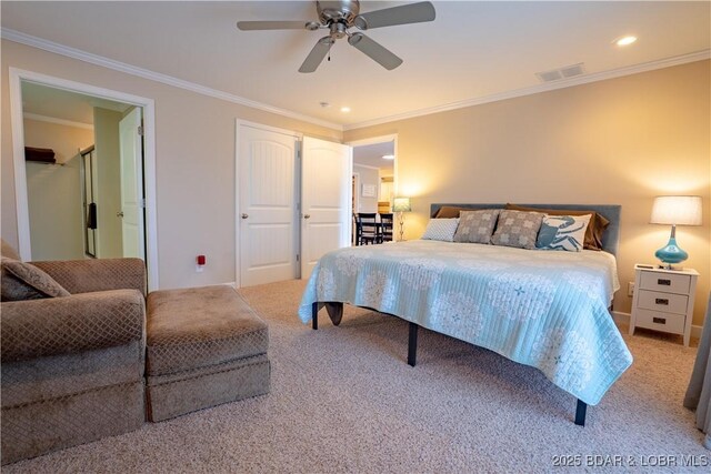 bedroom with visible vents, ornamental molding, recessed lighting, carpet, and baseboards