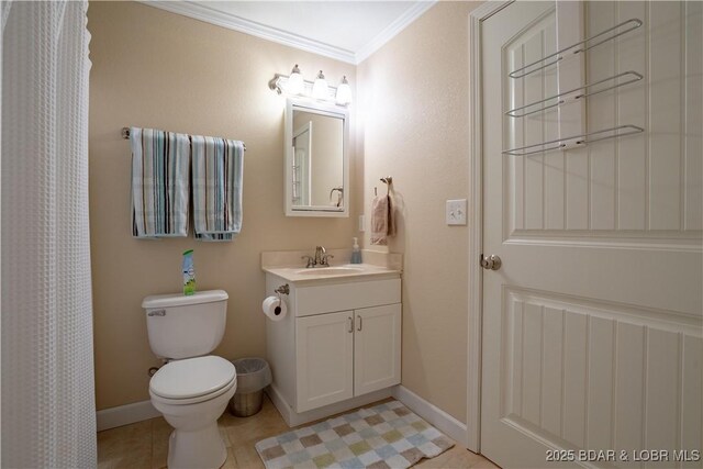 full bathroom featuring toilet, vanity, baseboards, and ornamental molding