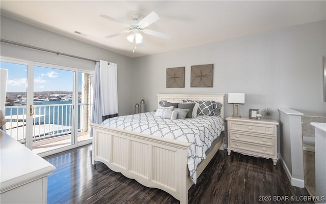 bedroom featuring dark wood finished floors, access to outside, a ceiling fan, and visible vents