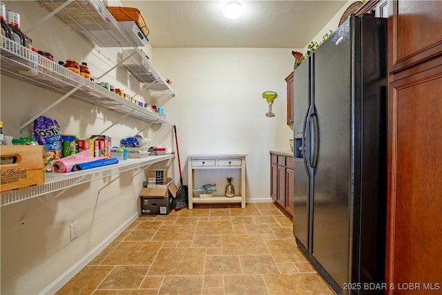 interior space featuring baseboards