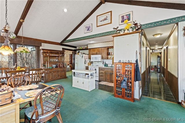 dining room featuring beamed ceiling, high vaulted ceiling, and dark colored carpet