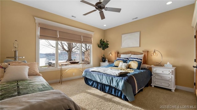 carpeted bedroom with visible vents, recessed lighting, and baseboards