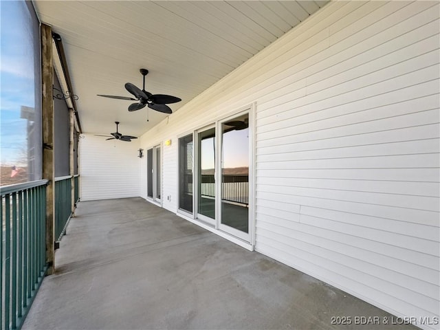 view of patio featuring a ceiling fan