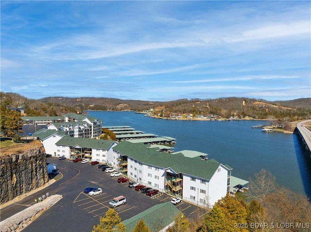 birds eye view of property featuring a water view