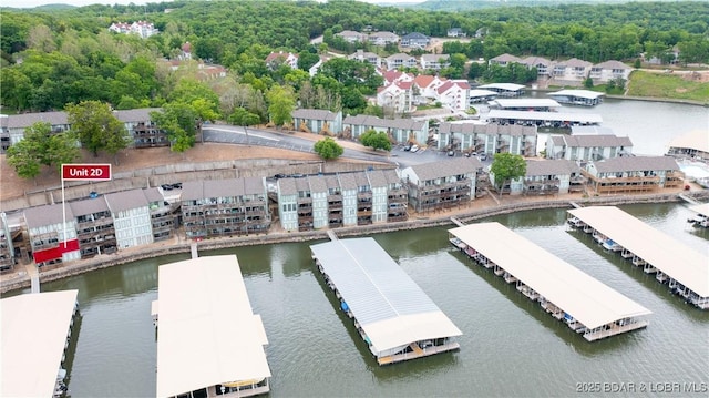 birds eye view of property featuring a residential view and a water view