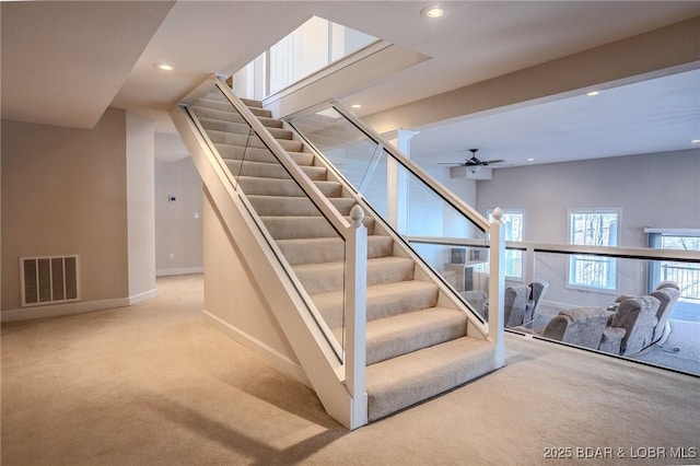 staircase featuring visible vents, recessed lighting, carpet, baseboards, and ceiling fan