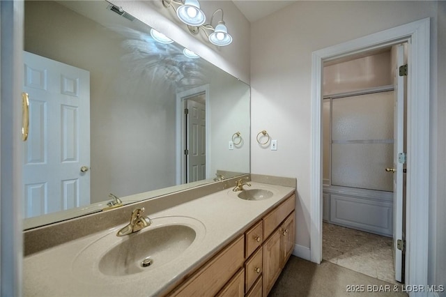 full bathroom featuring a sink, visible vents, enclosed tub / shower combo, and double vanity