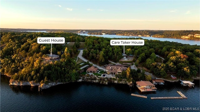 120 Carson Dr, Sunrise Beach, MO 65079 - aerial view at dusk of a water view and a view of trees