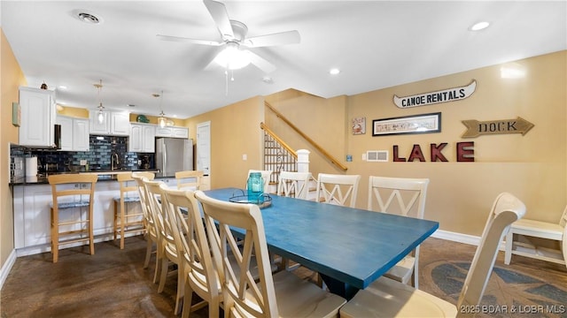 dining area with stairway, recessed lighting, baseboards, and ceiling fan