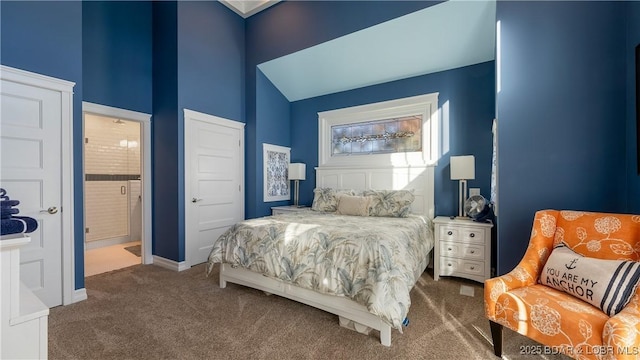 bedroom with lofted ceiling, carpet flooring, and baseboards